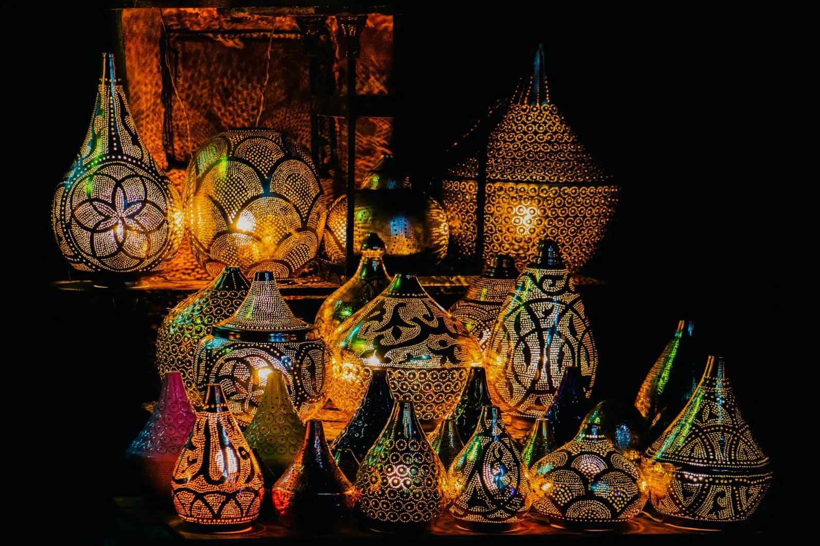 a bunch of vases that are sitting on a table